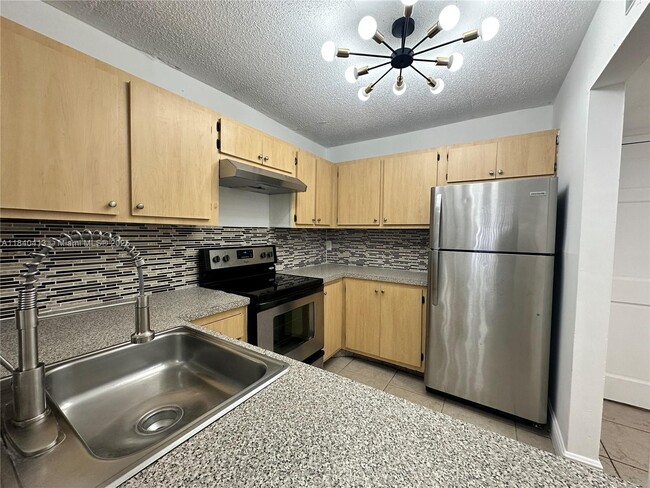 property at 13685 NE 10th Ave