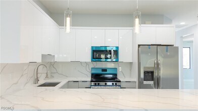 2404-2406 Crawford Ave N in Lehigh Acres, FL - Building Photo - Building Photo