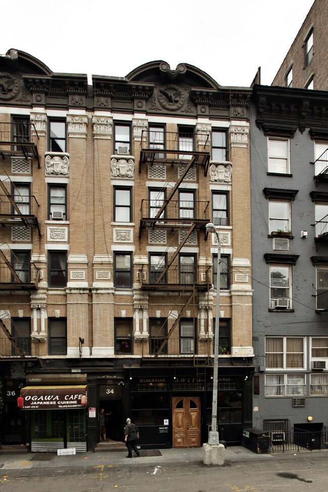 34 E 4th St in New York, NY - Building Photo - Building Photo