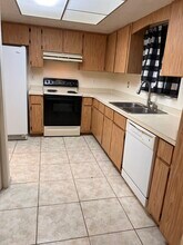 25038 Harborview Rd, Unit B in Port Charlotte, FL - Building Photo - Building Photo