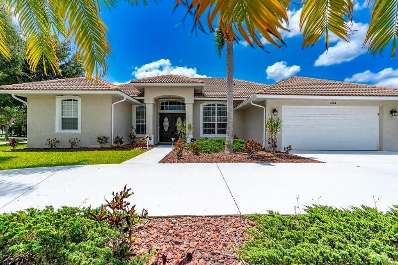 2904 SW Sutton Pl in Palm City, FL - Building Photo