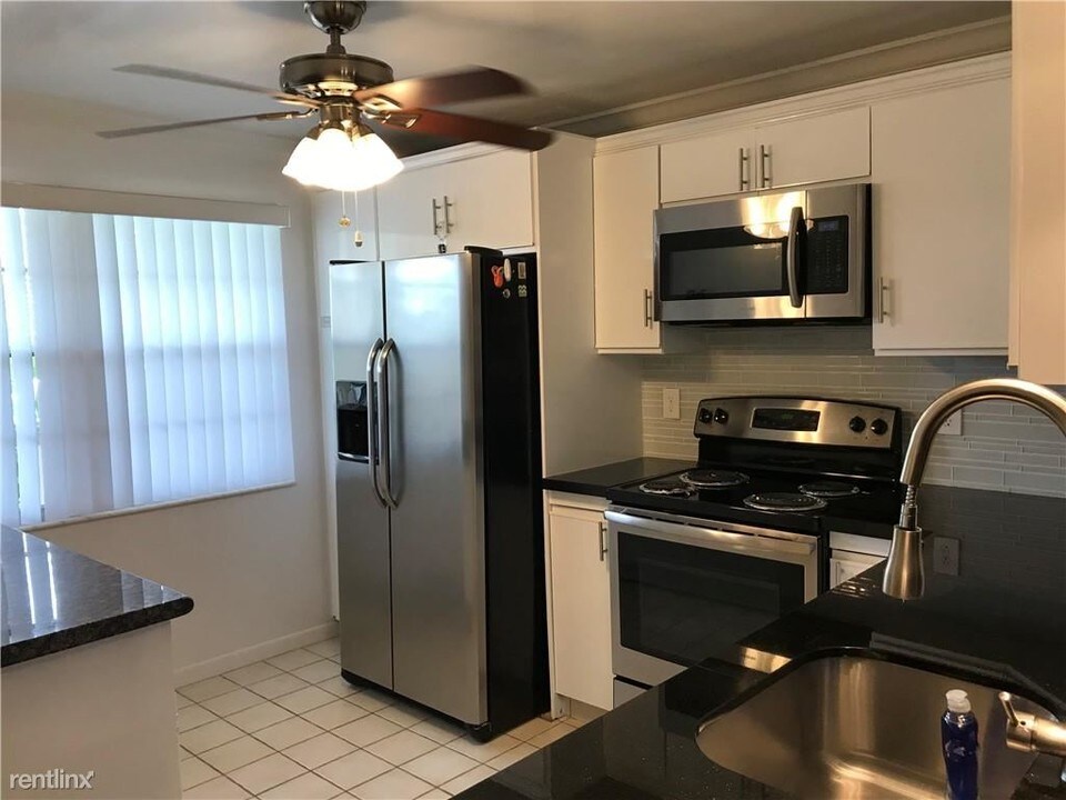 2002 Granada Dr in Coconut Creek, FL - Building Photo