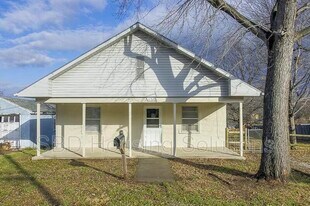 11518 Hackett St in Sugar Creek, MO - Building Photo
