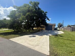 1453 SW Sudder Ave in Port St. Lucie, FL - Foto de edificio - Building Photo