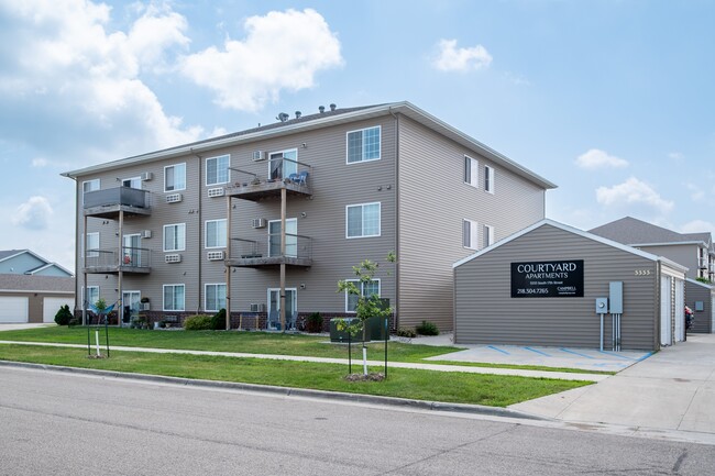 Courtyard Apartments in Moorhead, MN - Building Photo - Building Photo