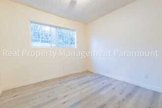 8318 Kansas Ave in Los Angeles, CA - Building Photo - Building Photo