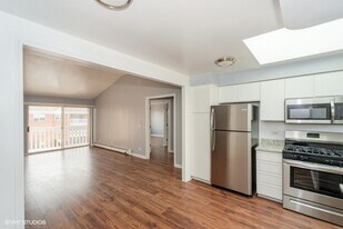 6560 W Belmont Ave, Unit 303 in Chicago, IL - Building Photo