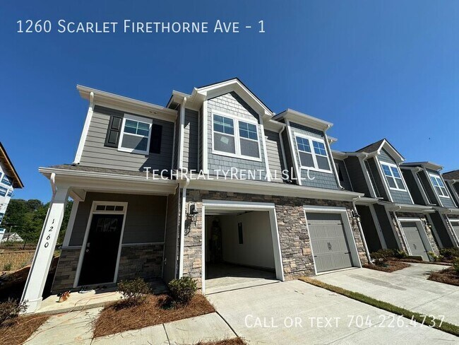 property at 1260 Scarlet Firethorne Ave NW