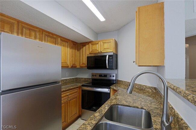 12670 Equestrian Cir in Ft. Myers, FL - Building Photo - Building Photo