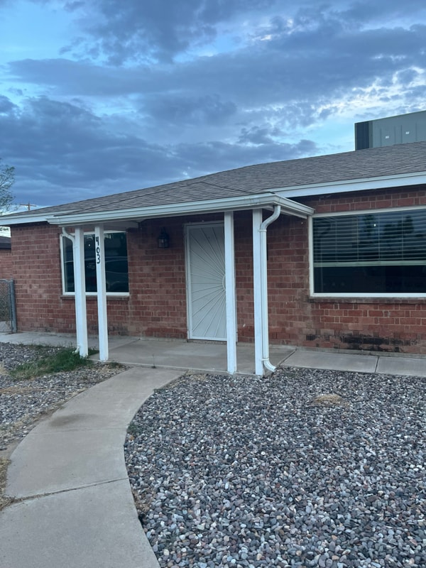 property at 403 E 7th St