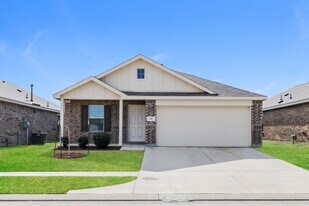 911 Lady Bird St in Ennis, TX - Building Photo