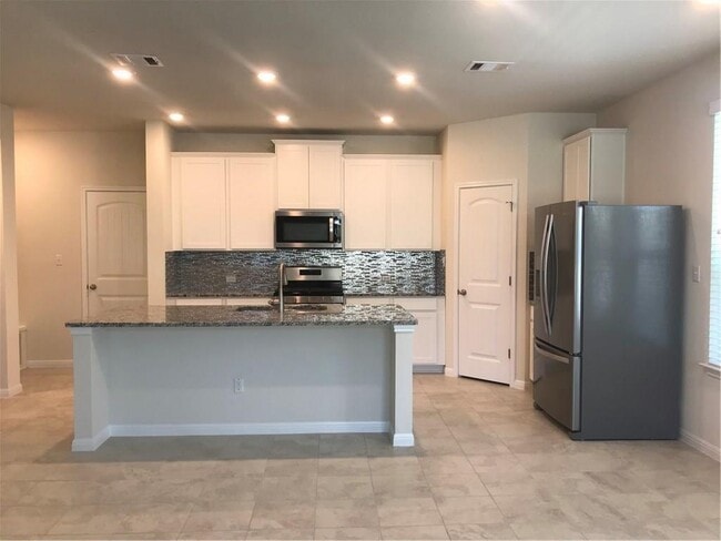 115 Iron Rail Rd in Dripping Springs, TX - Building Photo - Building Photo