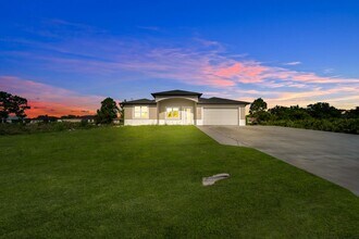104 Harry Ave S in Lehigh Acres, FL - Building Photo - Building Photo