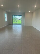 1215 Tangled Orchard Tr in Loxahatchee, FL - Building Photo - Building Photo