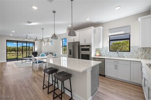 20088 KIngmont Dr in Estero, FL - Building Photo