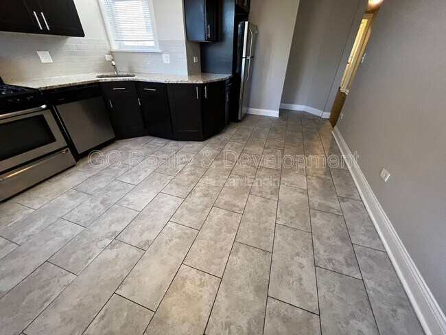 6031 S Eberhart Ave in Chicago, IL - Building Photo - Building Photo