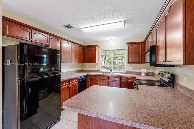 3812 Dove Landing Rd-Unit -13 in Lake Park, FL - Building Photo - Building Photo