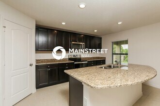 35665 Rose Moss Ave in Leesburg, FL - Foto de edificio - Building Photo