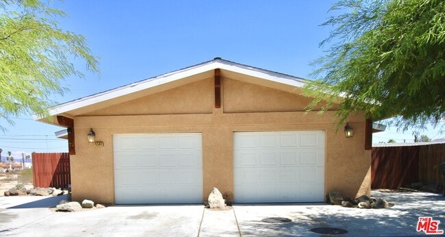 property at 6587 Oasis Ave