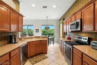 10080 Valiant Ct in Miromar Lakes, FL - Building Photo - Building Photo