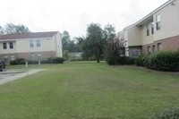 Georgian Woods Apartments in Douglas, GA - Building Photo - Building Photo