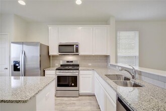 434 Eves Necklace Dr. in Mustang Ridge, TX - Building Photo - Building Photo