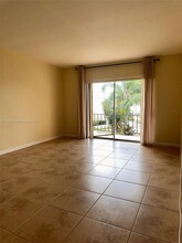 13903 SW 90th Ave, Unit 214E in Miami, FL - Building Photo - Building Photo