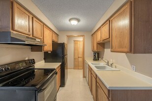 Whispering Pines Condominiums in Aurora, CO - Building Photo