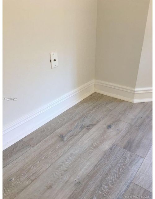 16102 Emerald Estates Dr-Unit -214 in Weston, FL - Building Photo