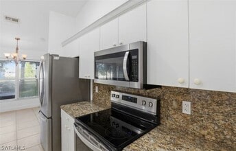 2354 NW 36th Pl in Cape Coral, FL - Building Photo - Building Photo