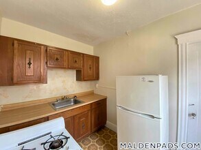 349 Pleasant St, Unit B1-9 in Malden, MA - Foto de edificio - Building Photo