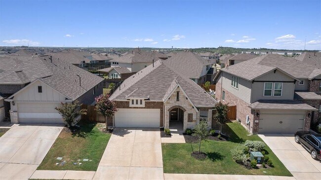 562 Leadtree Loop in Mustang Ridge, TX - Building Photo - Building Photo