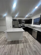 7668 Loftwood Ave in Las Vegas, NV - Building Photo - Building Photo