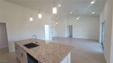 4016 NE 12th Ct in Cape Coral, FL - Building Photo - Building Photo