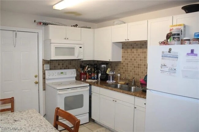 4407 Thomasson Ln in Naples, FL - Building Photo - Building Photo