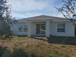 3927 NE 23rd Pl in Cape Coral, FL - Building Photo - Building Photo