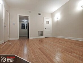 4036 N Ashland Ave, Unit E1 in Chicago, IL - Building Photo - Building Photo