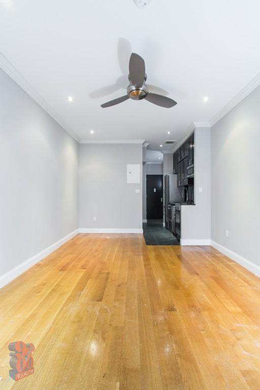 property at 213 E 26th St