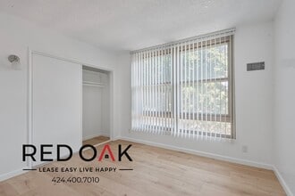 8619 Belford Ave in Los Angeles, CA - Foto de edificio - Building Photo
