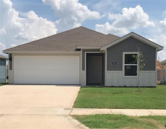 property at 206 NW Pinwheel St
