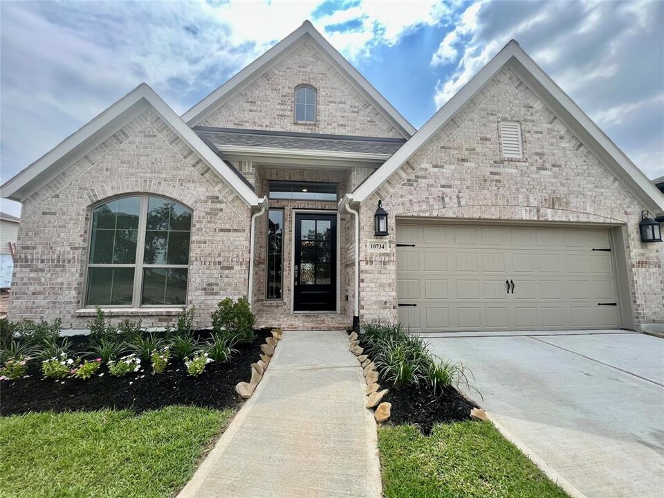 10734 Kingston Spg Dr in Sienna Plantation, TX - Building Photo