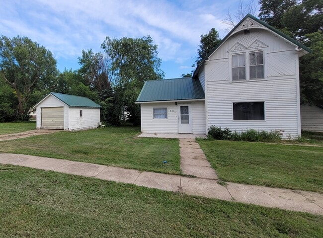 property at 505 E 3rd St