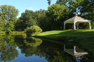 Mallard Pond Apartments & Condos in Howell, MI - Building Photo - Building Photo