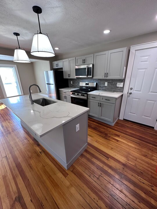 209-217 E Seneca St in Manlius, NY - Building Photo