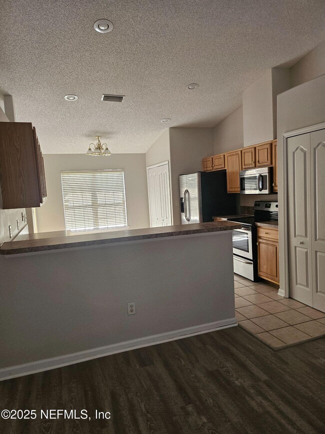 9827 Nelson Forks Dr in Jacksonville, FL - Building Photo - Building Photo