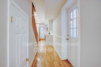 203 S Regester St in Baltimore, MD - Foto de edificio - Building Photo