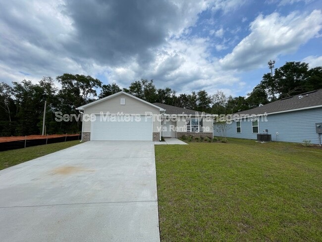 property at 6521 June Bug Dr