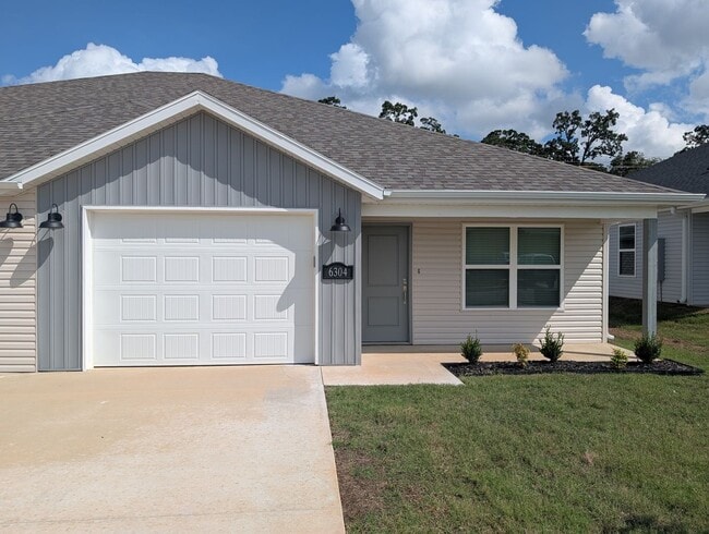 property at 6311 NW Kathleen St