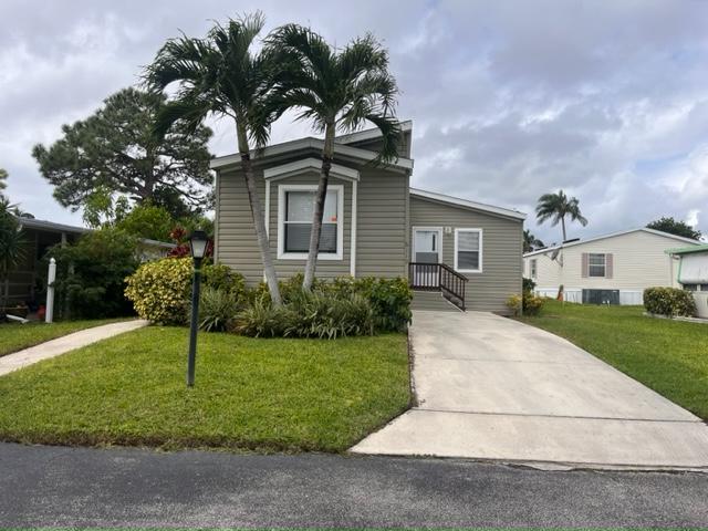 6119 N Guava Ln in Atlantis, FL - Building Photo - Building Photo