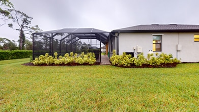 15888 Honeysuckle St in Port Charlotte, FL - Building Photo - Building Photo